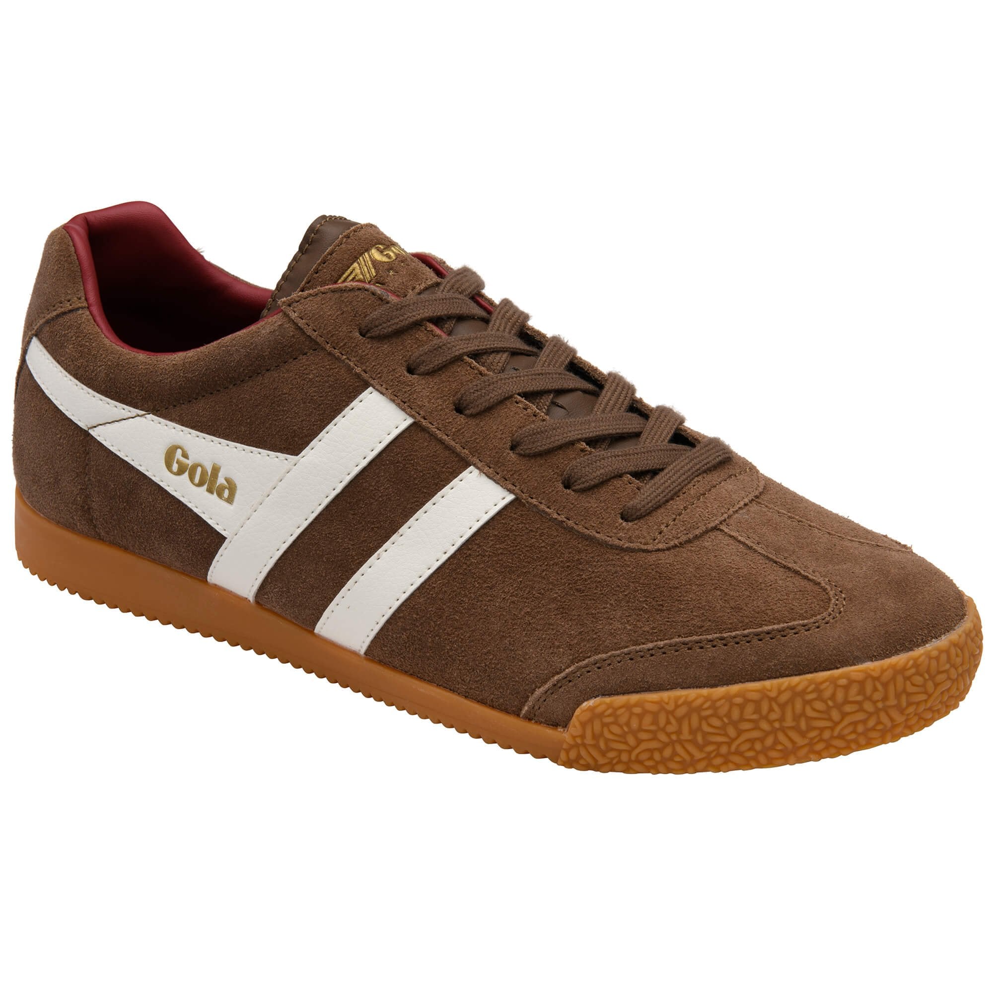Brown trainer with white stripes and 'Gola' branding on a white background