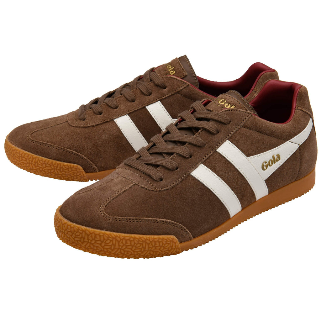 Brown trainers with white stripes and 'Gola' branding on a white background