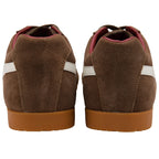 Brown suede trainers with white stripes on a white background