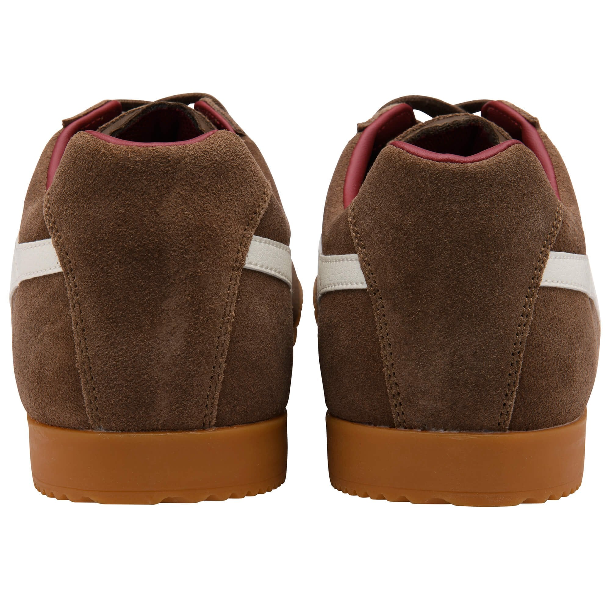 Brown suede trainers with white stripes on a white background