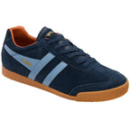 Navy blue trainer with brown sole on a white background