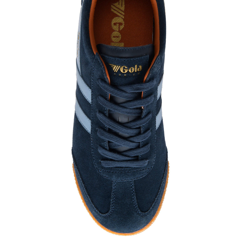 Navy blue trainer with white stripes and orange lining on a white background