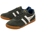 Green trainers with white stripes and brown soles on a white background