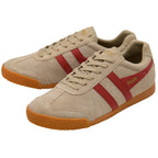 Pair of Gola suede trainers in sand and red on a white background