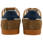 Brown suede trainers with navy accents on a white background