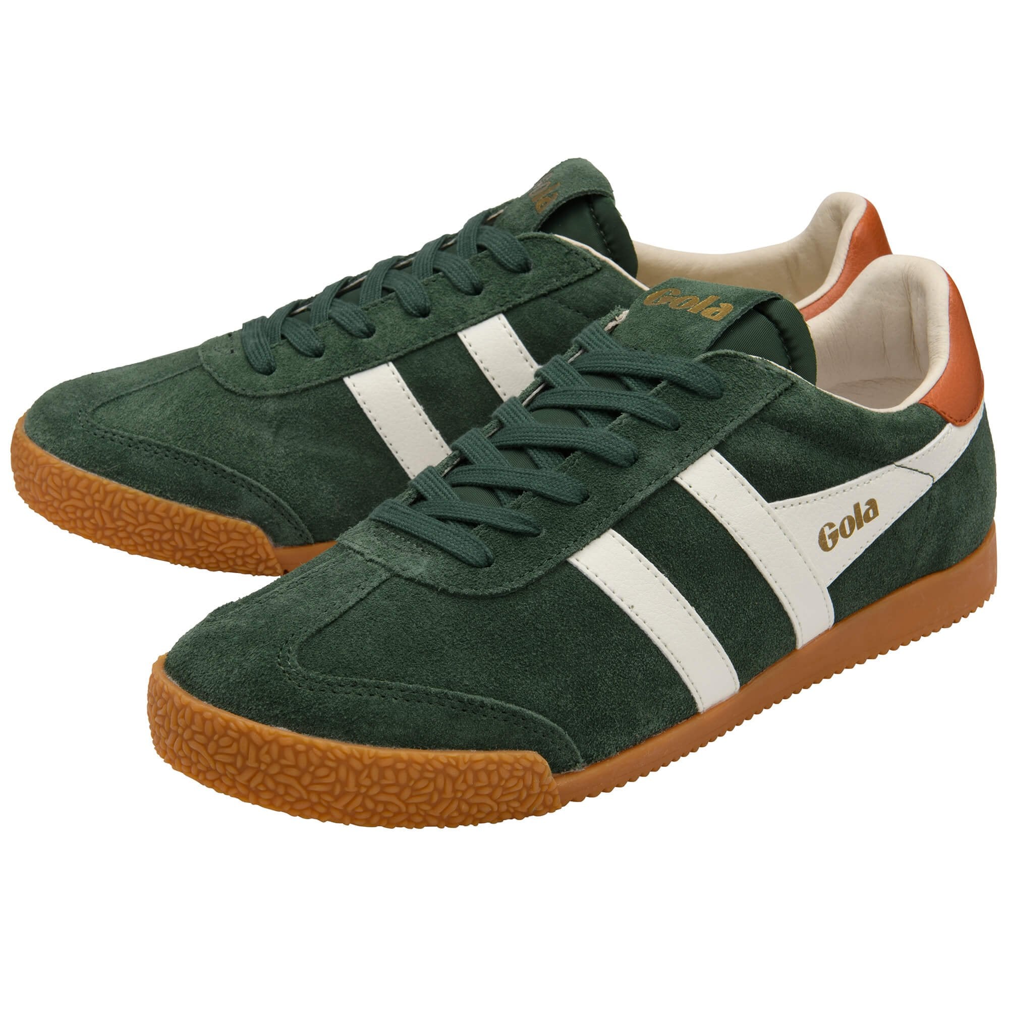 Green trainers with white stripes and brown soles on a white background