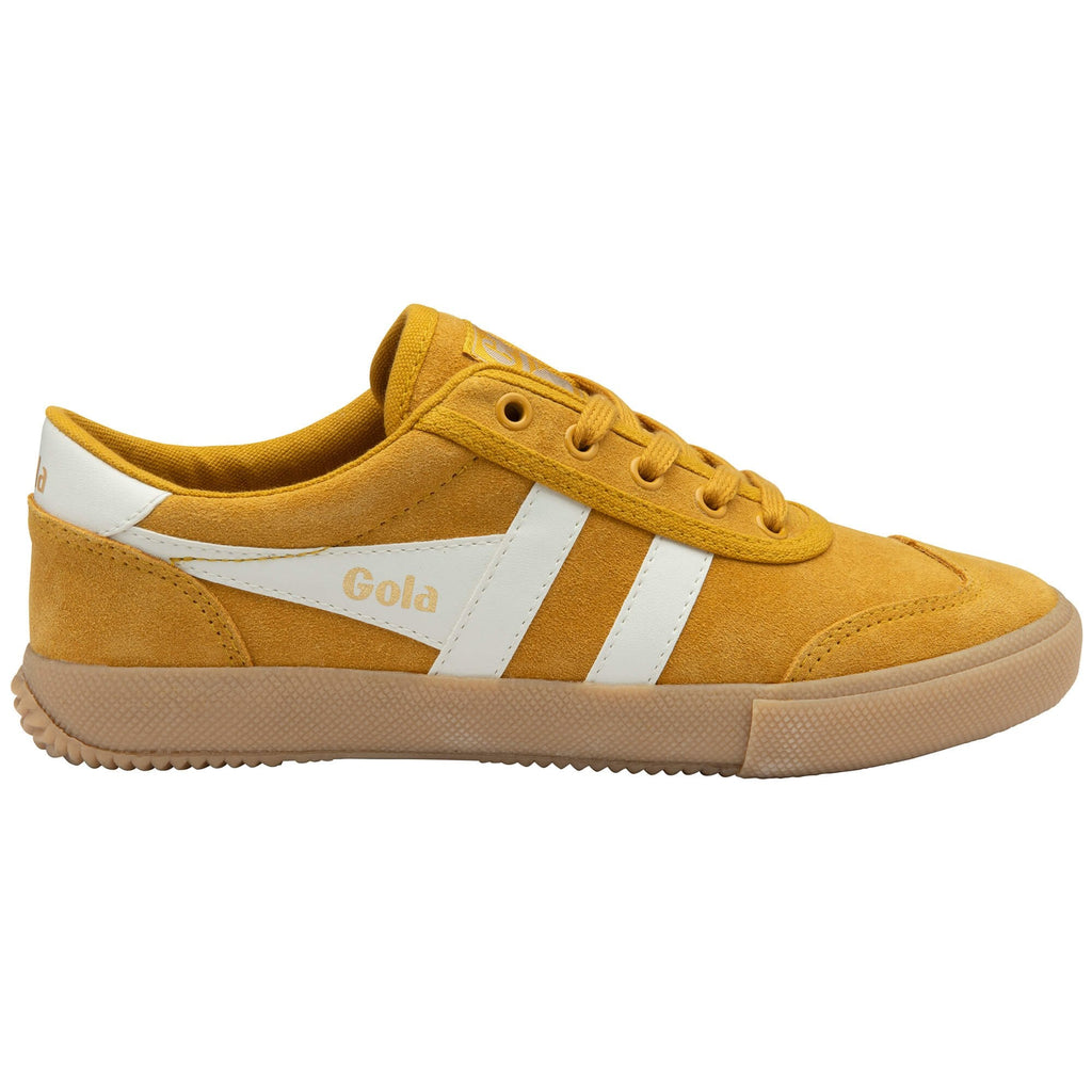 Gola trainer in yellow with white stripes and a brown sole on a white background