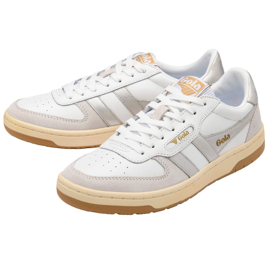 White and grey Gola trainers with brown soles on a white background