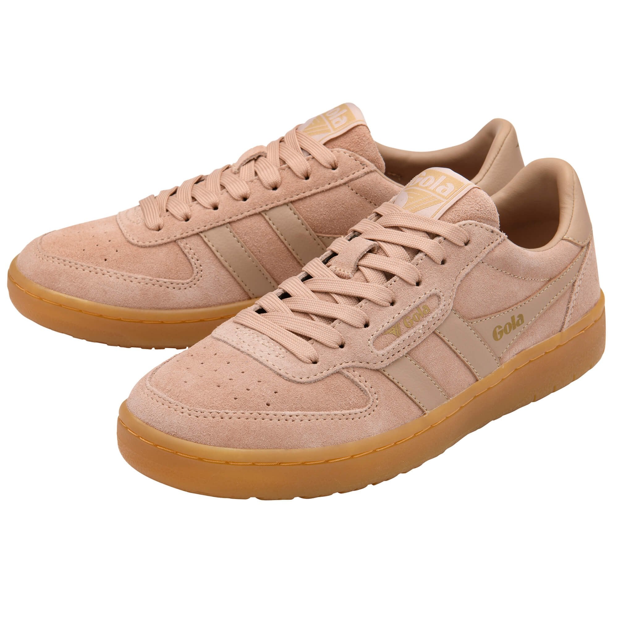 Pair of Gola trainers in light pink with gum soles and laces on a white background