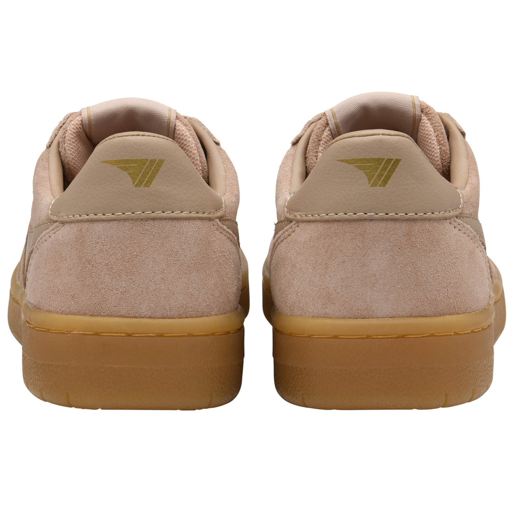 Pair of beige Gola trainers with gum soles on a white background