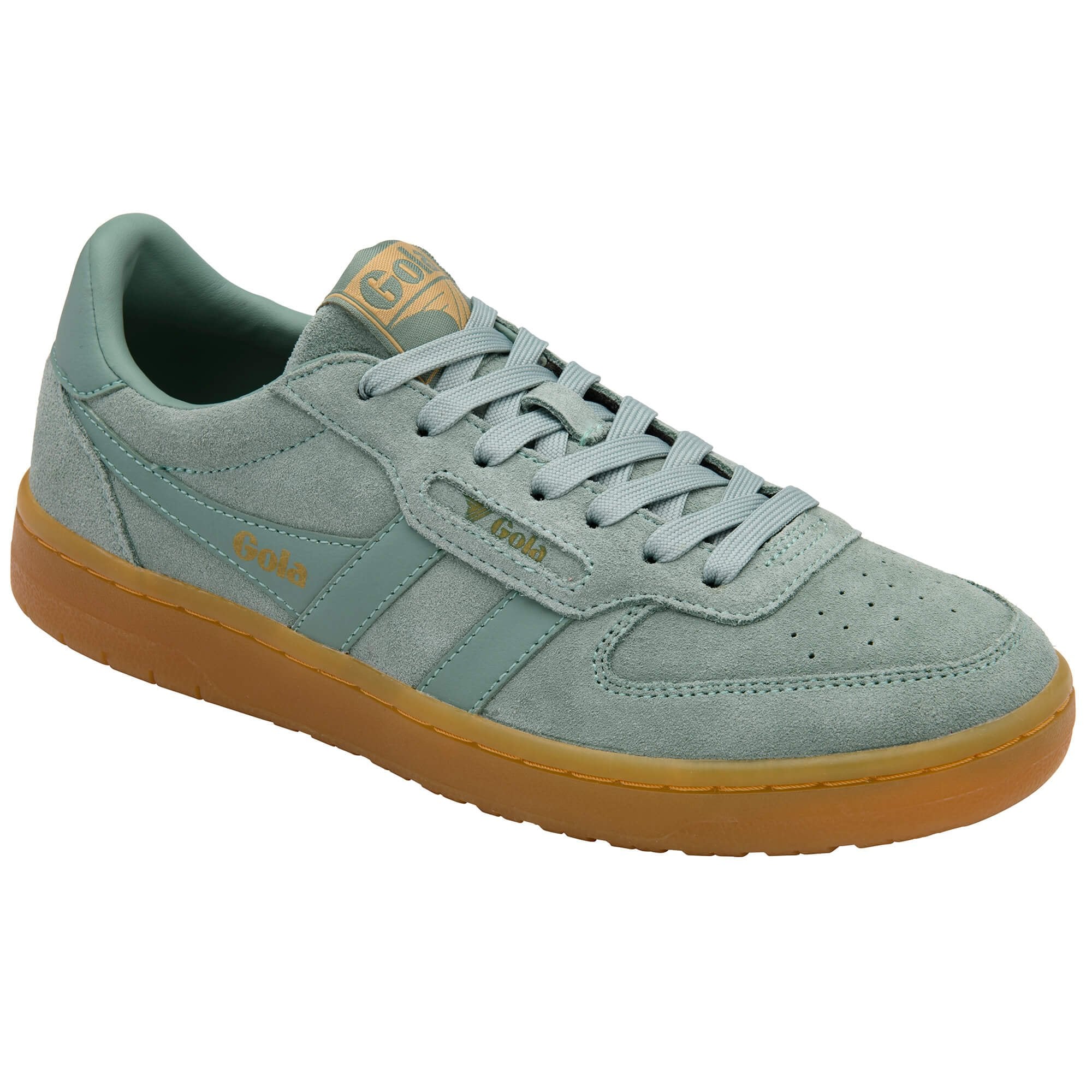 Light green Gola trainer with gum sole on a white background