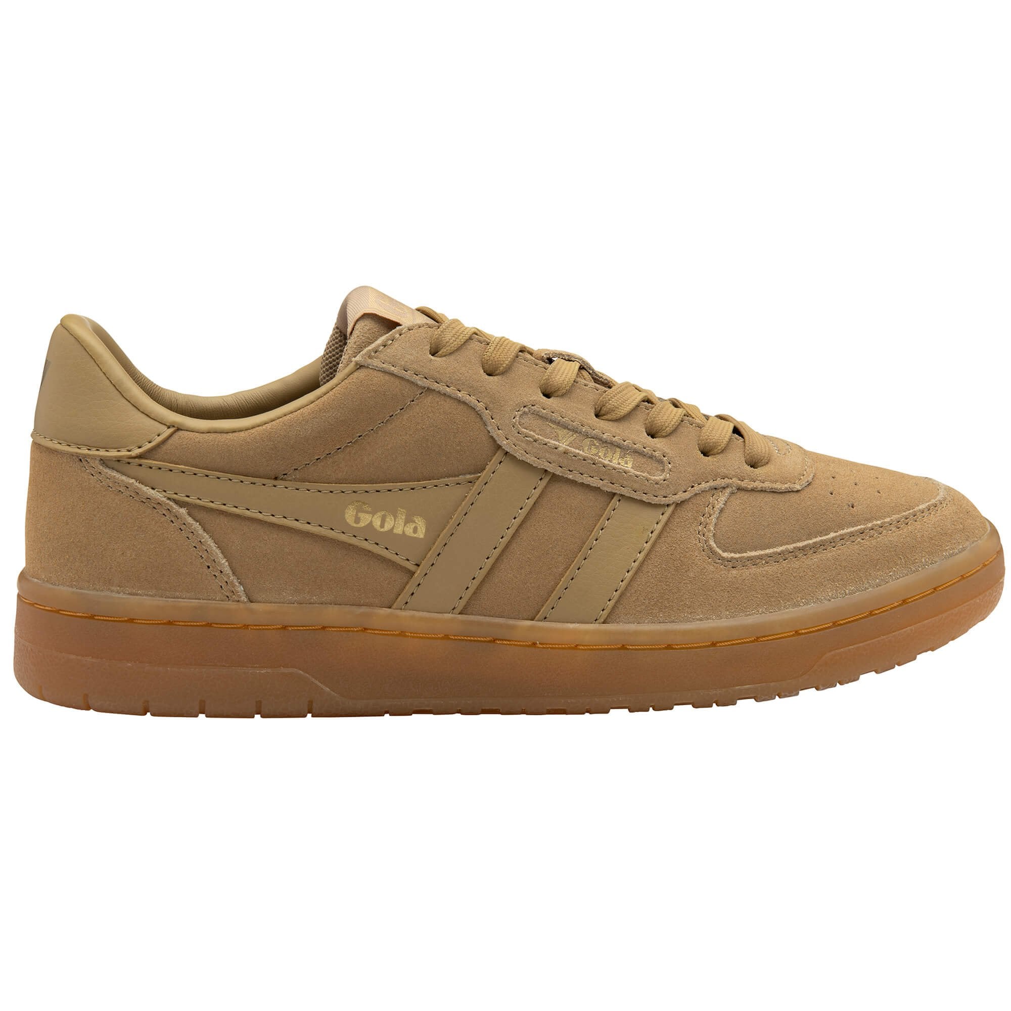 Tan sneaker with gum sole on a white background