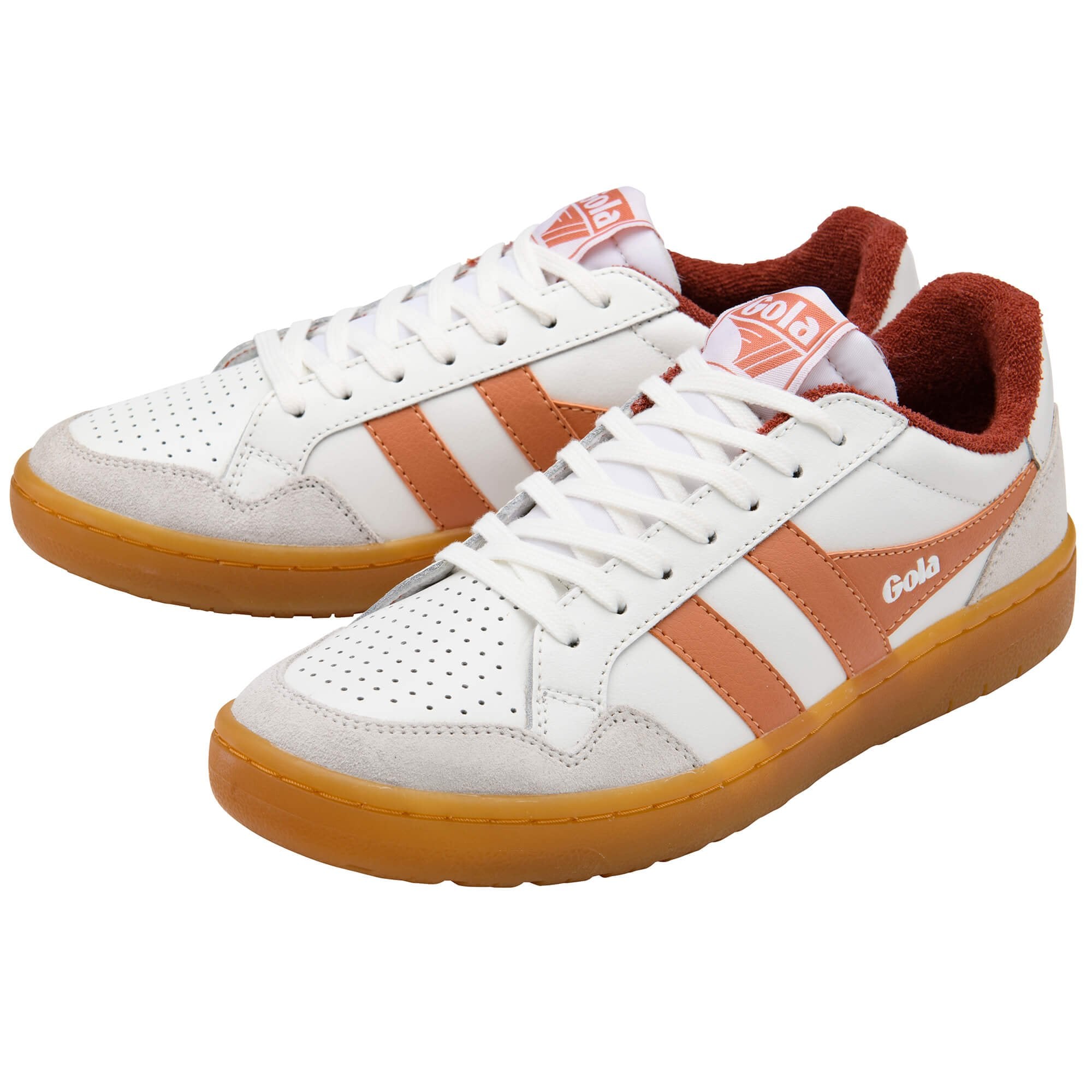 White Gola trainers with orange and red accents on a white background