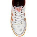 White Gola trainer with orange accents and gum sole on a white background