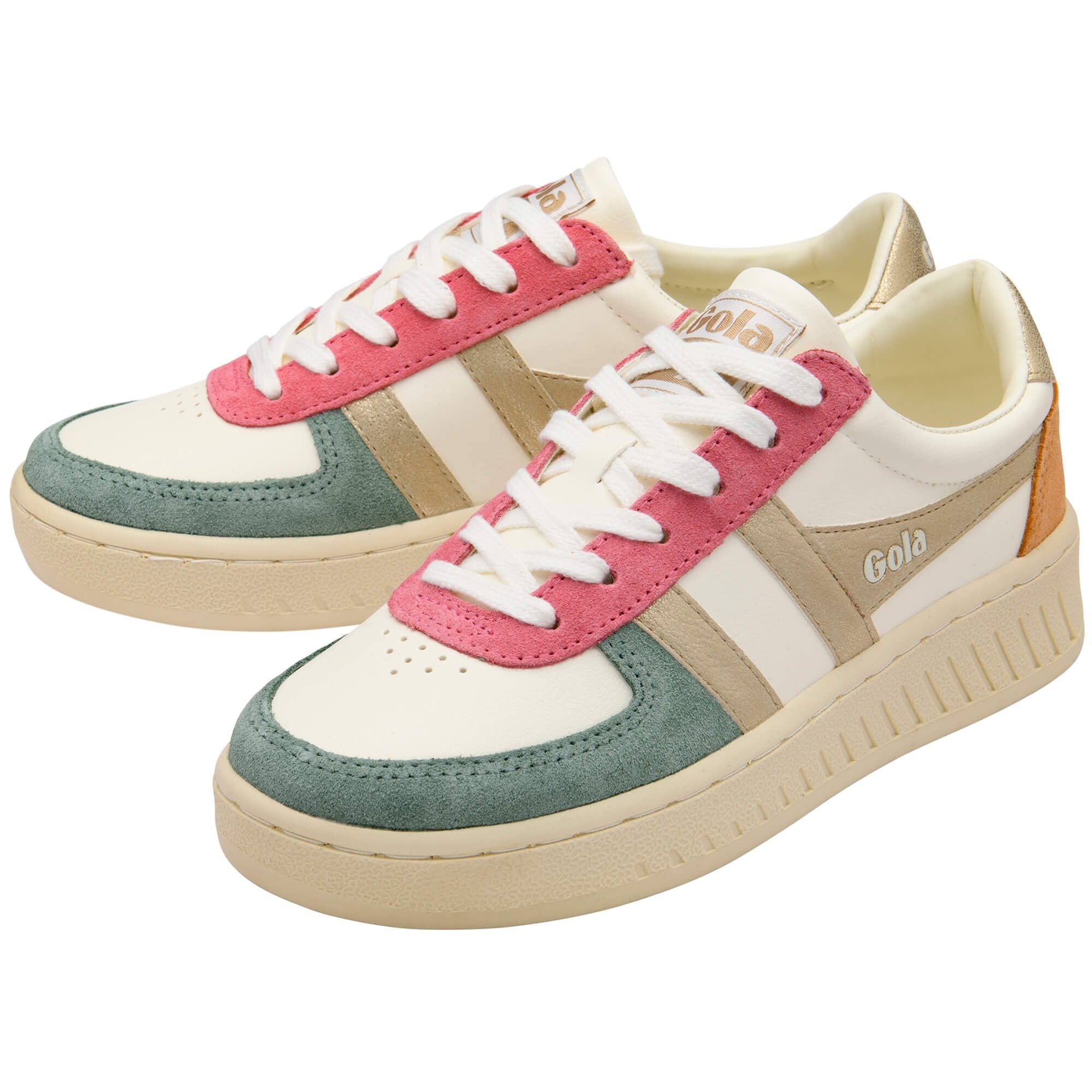 White Gola trainers with pink, green, and gold accents on a white background