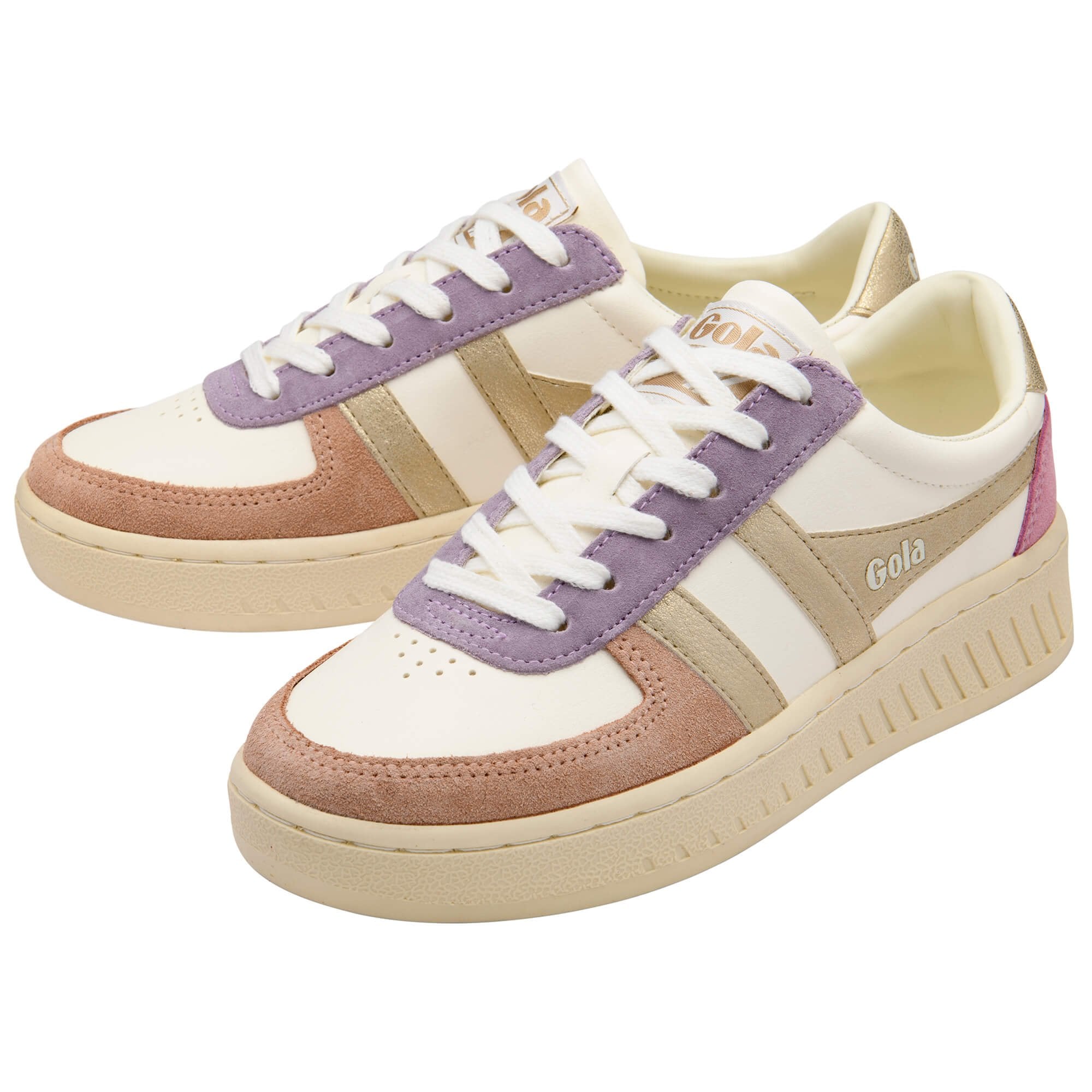 Pair of white Gola trainers with gold, pink and purple accents on a white background