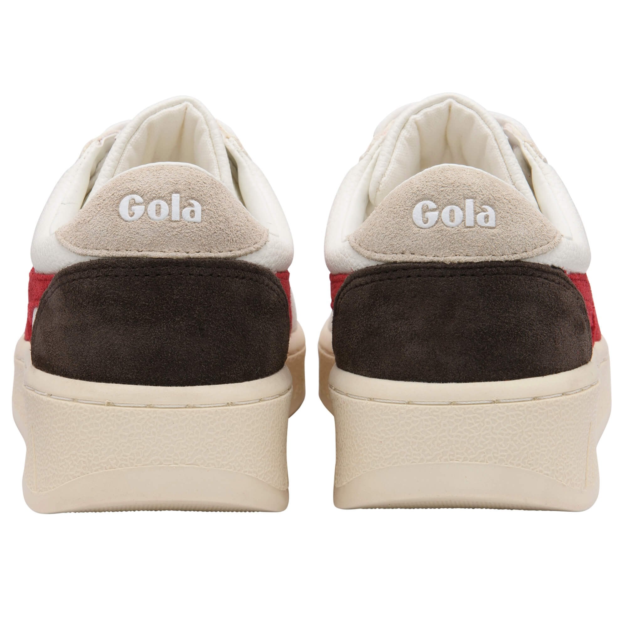 Pair of Gola trainers with a beige heel tab, red and brown accents on a white background