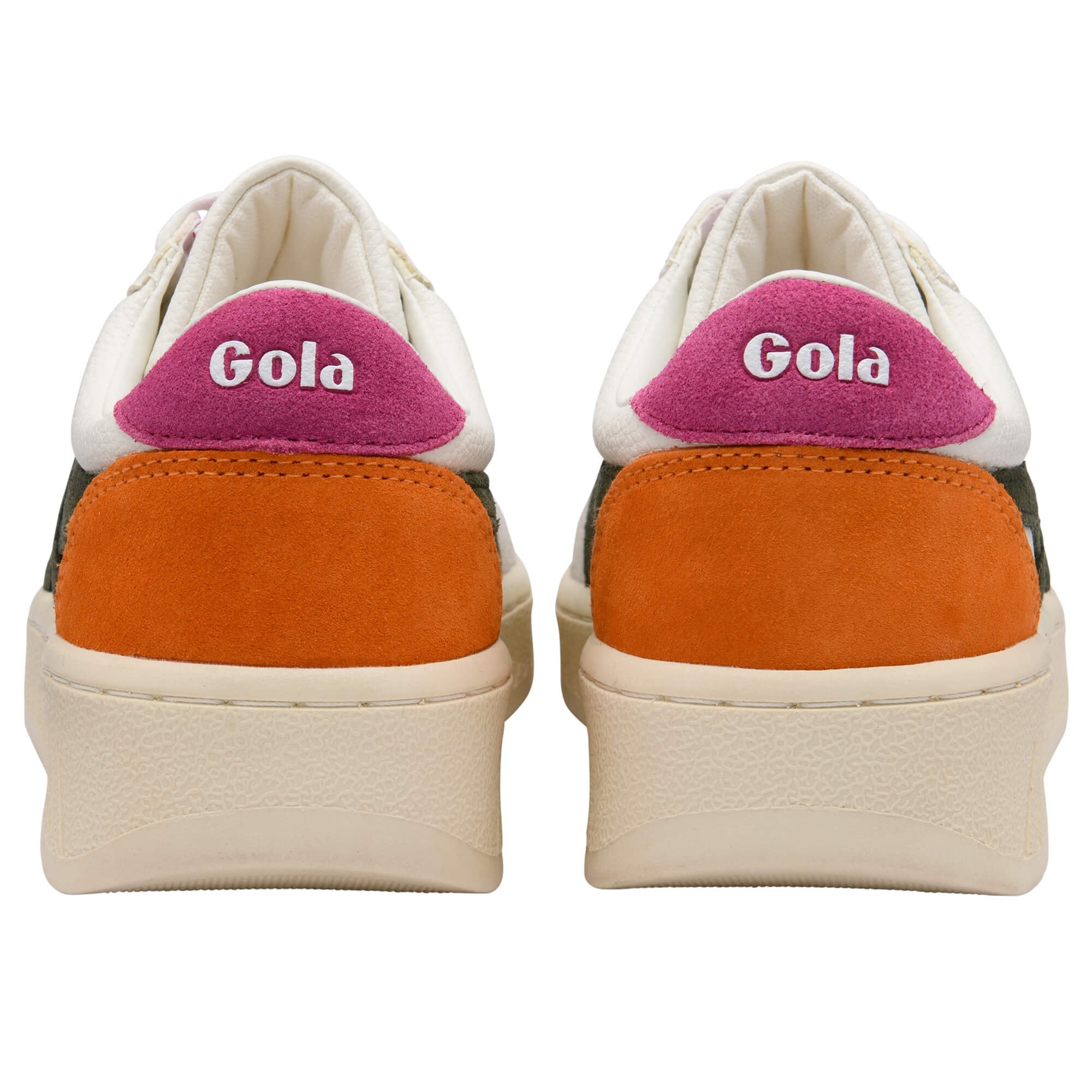 Pair of white Gola trainers with orange accents and pink heel tab on a white background