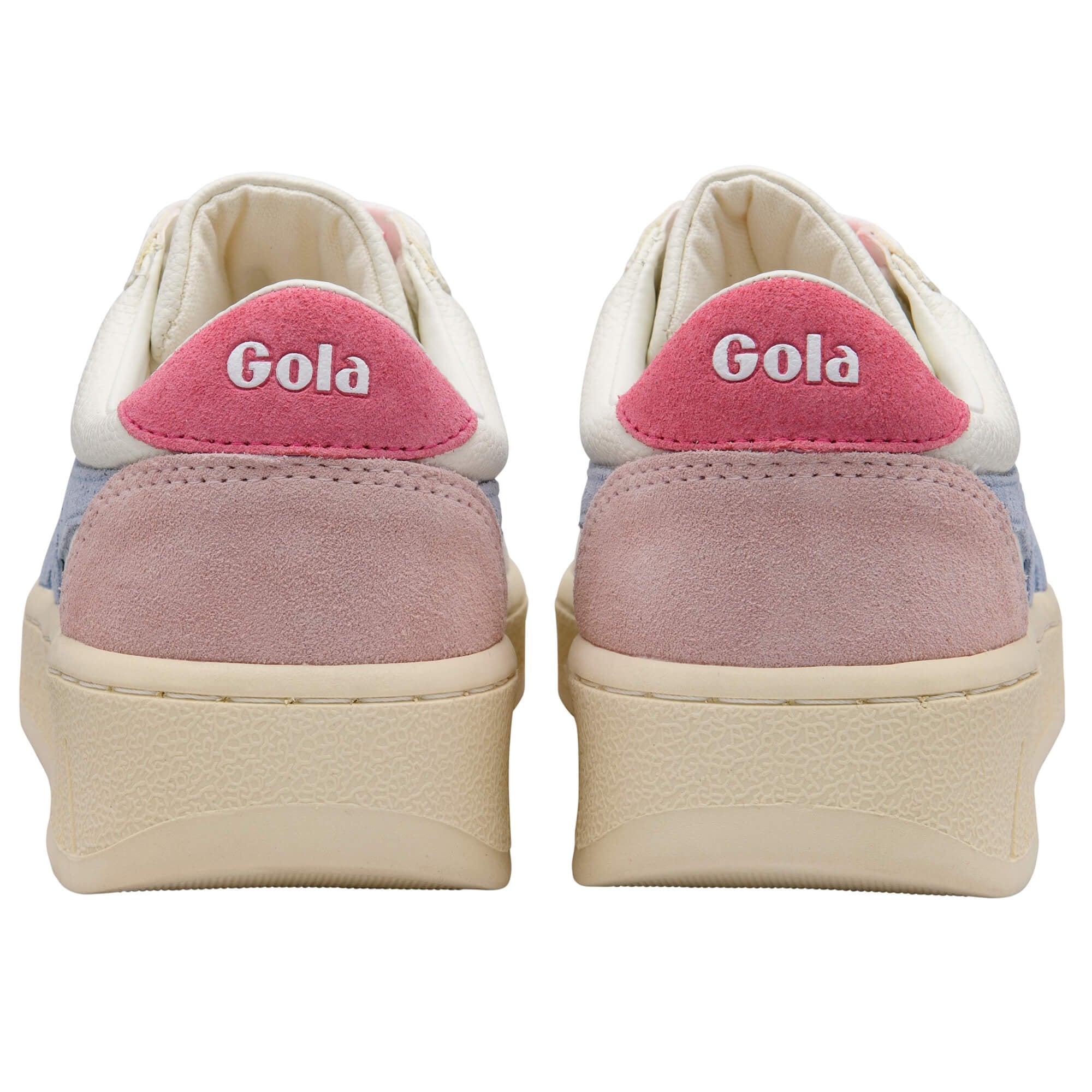 Pair of Gola trainers with pink and beige accents on a white background