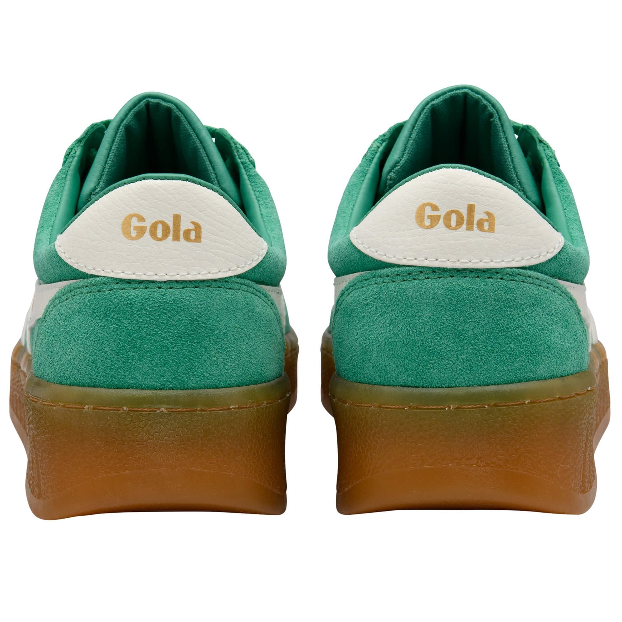 Green Gola trainers with white heel tab and brown soles on a white background