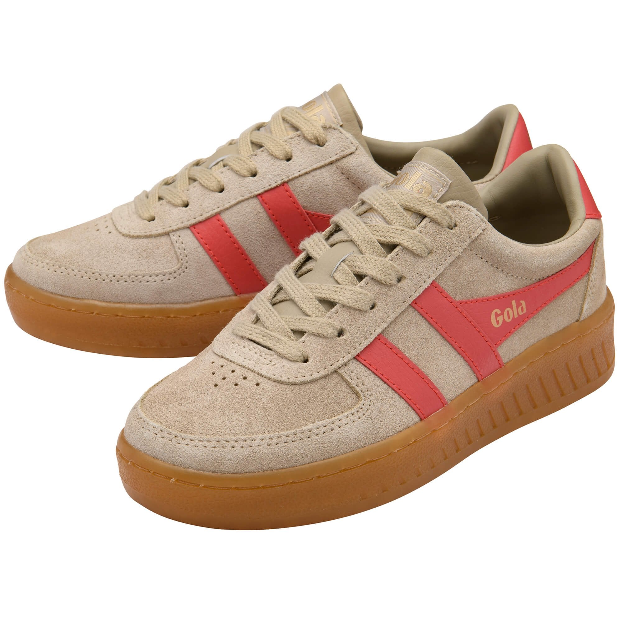 Beige Gola trainers with red stripes and brown soles on a white background