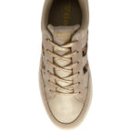 Beige Gola trainer with brown accents on a white background