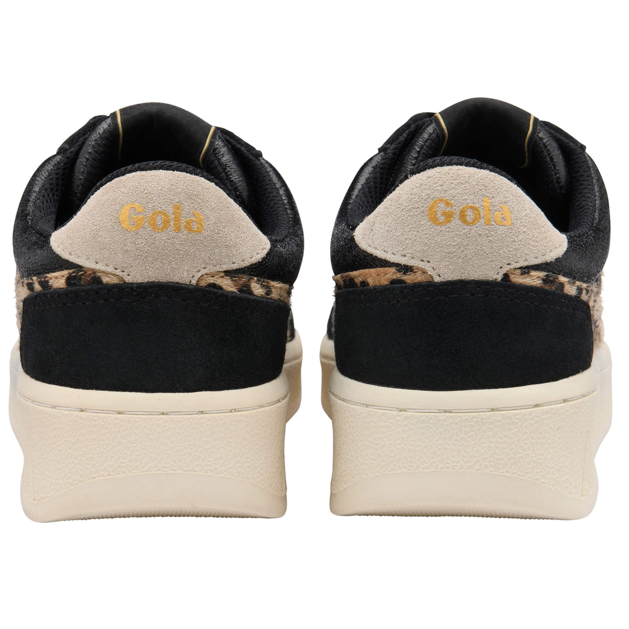 Black trainers with 'Gola' branding on a white background