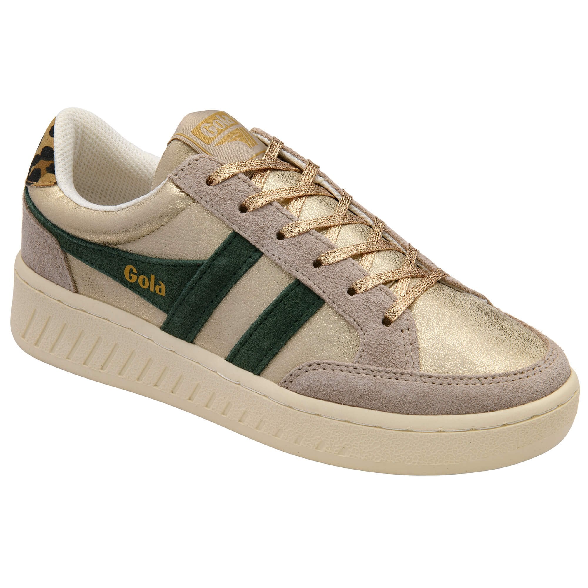 Beige and green Gola trainer with gold accents on a white background