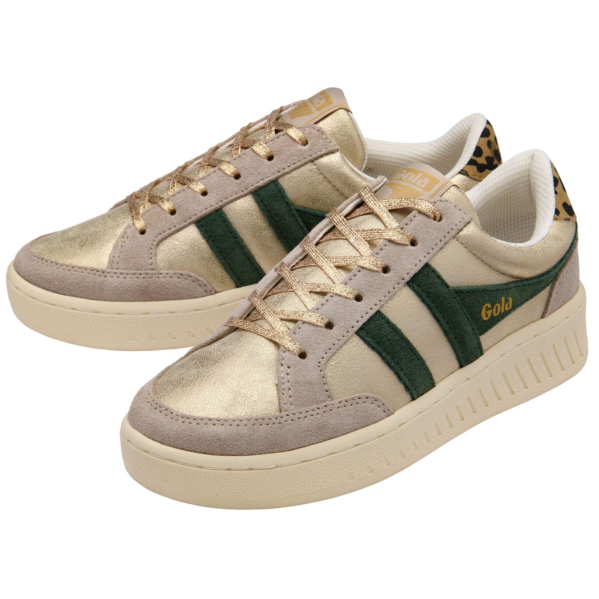 Pair of beige and green Gola trainers with gold accents on a white background