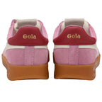 Pair of Gola trainers, pink suede with red heel tab and gold Gola logo, gum sole, rear view on a white background