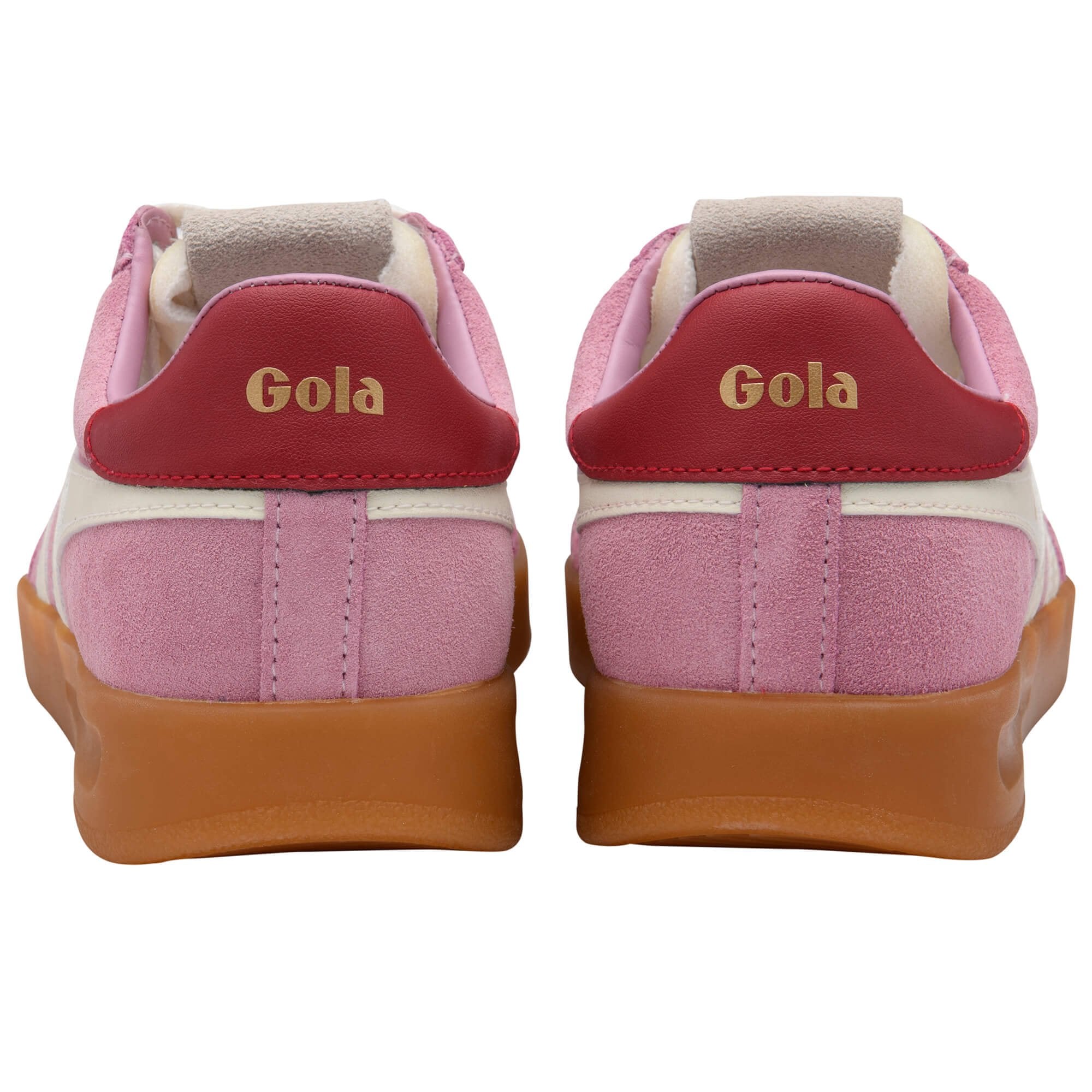 Pair of Gola trainers, pink suede with red heel tab and gold Gola logo, gum sole, rear view on a white background