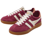 Maroon trainers with white stripes and brown soles on a white background
