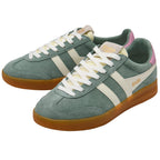 Pair of green Gola trainers with white laces and brown soles on a white background