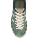Green Gola trainer with white laces and visible brand logo on a white background