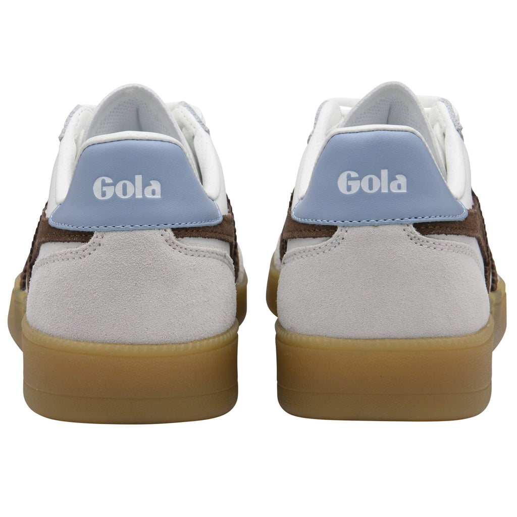 Pair of white Gola trainers with blue accents and gum soles on a white background