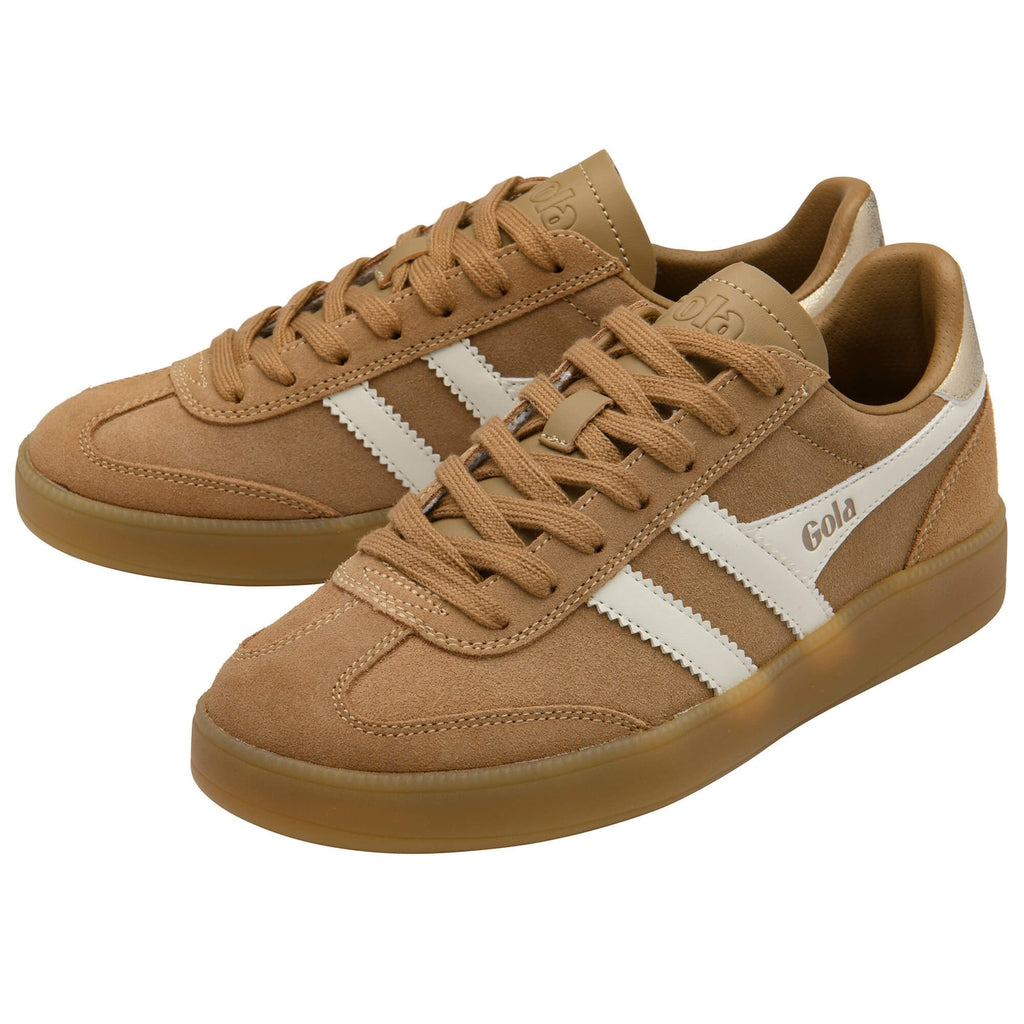 Pair of Gola trainers in tan with white stripes and gum sole on a white background