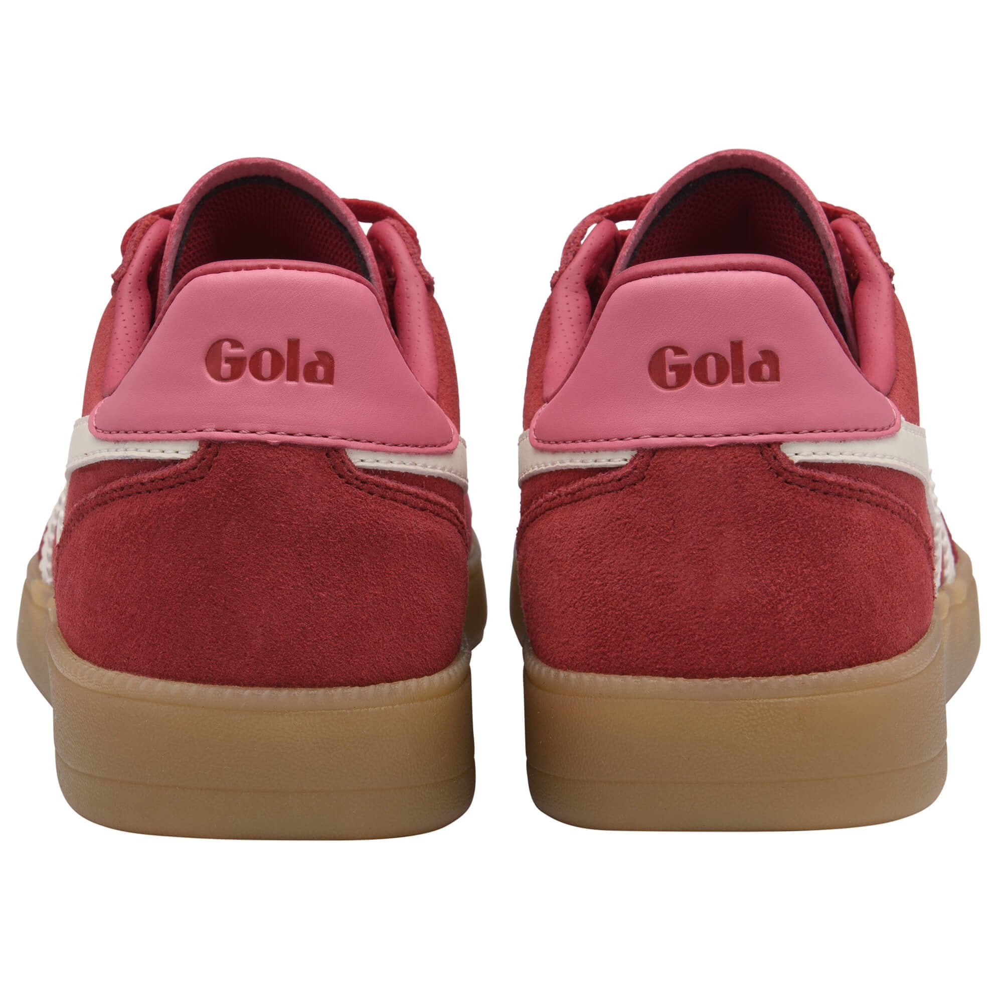 Pair of Gola trainers in red with pink heel tab and gum sole on a white background