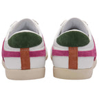 Pair of white Gola trainers with green heel tabs, pink side stripes, and brown vertical heel strips on a white background