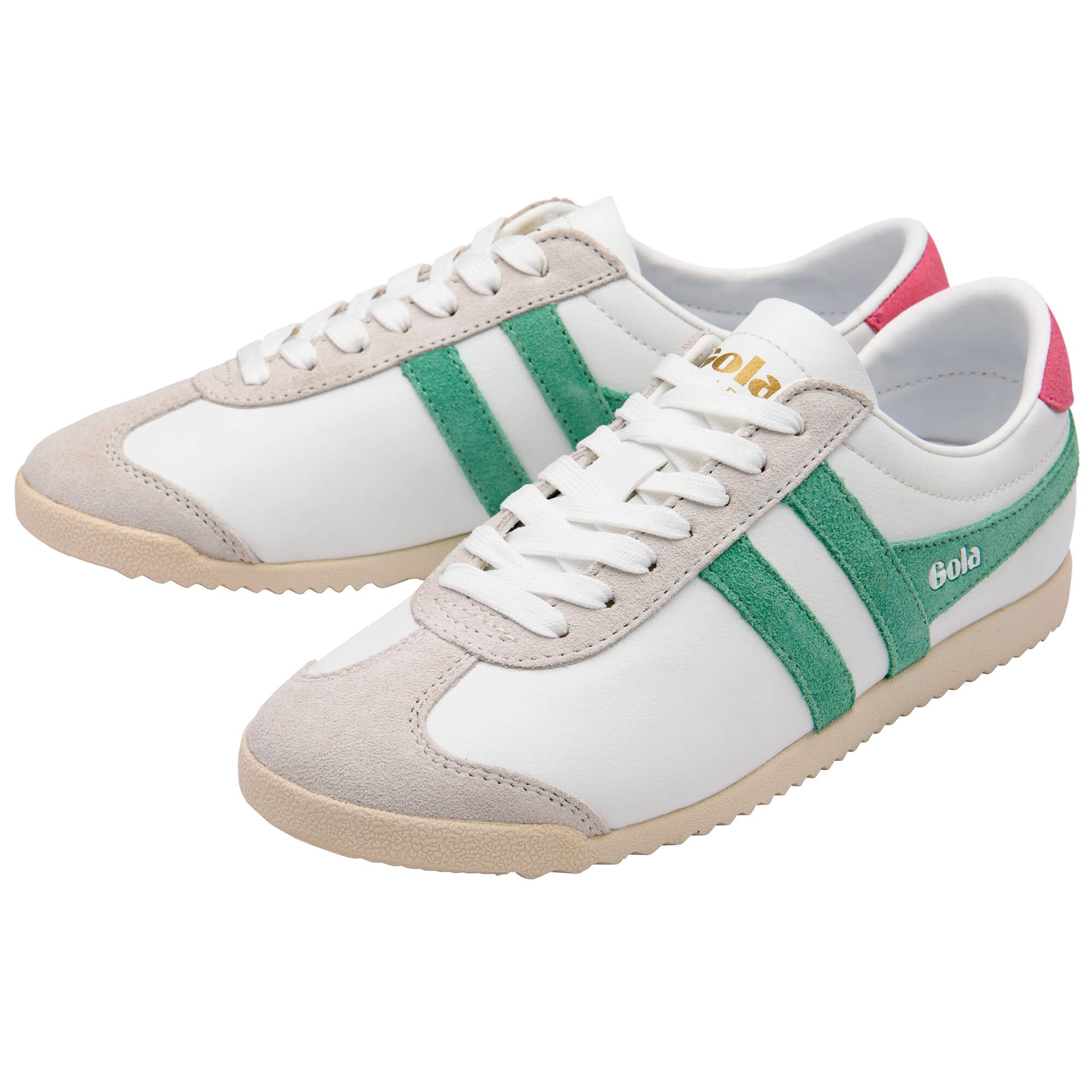 Pair of white Gola trainers with green stripes and beige accents on a white background