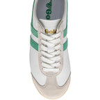 White Gola trainer with green suede stripes and beige accents on a white background