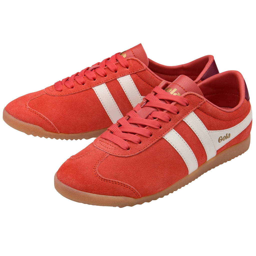 Pair of Gola trainers in red with white stripes and gum sole on a white background