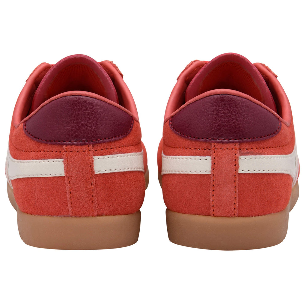 Red Gola trainers with white stripes on a white background
