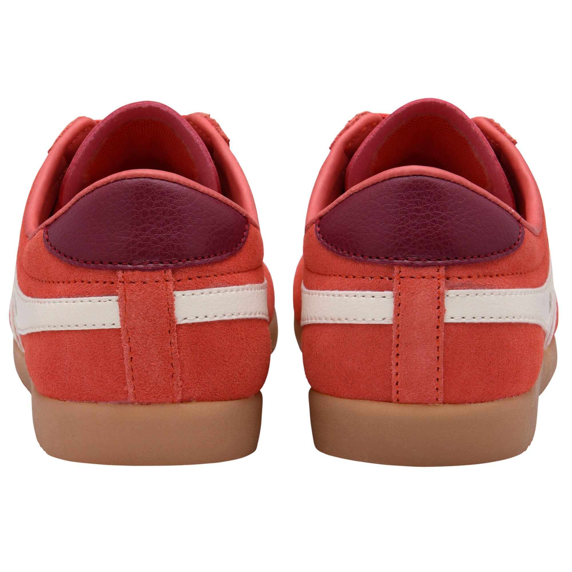 Red Gola trainers with white stripes on a white background