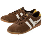 Brown Gola trainers with white stripes and yellow heel tab on a white background