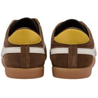Brown Gola trainers with yellow and white accents on a white background