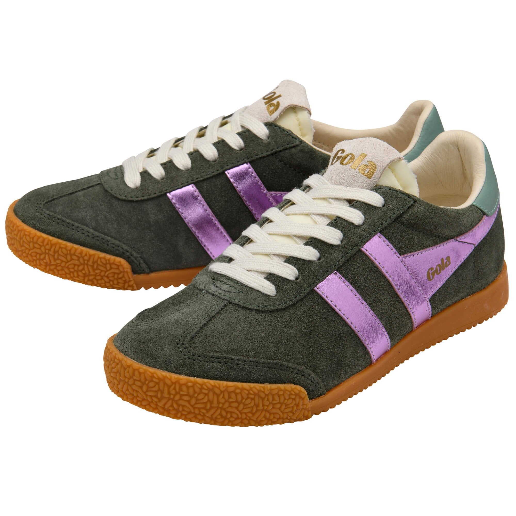 Pair of green trainers with purple accents and brown soles on a white background