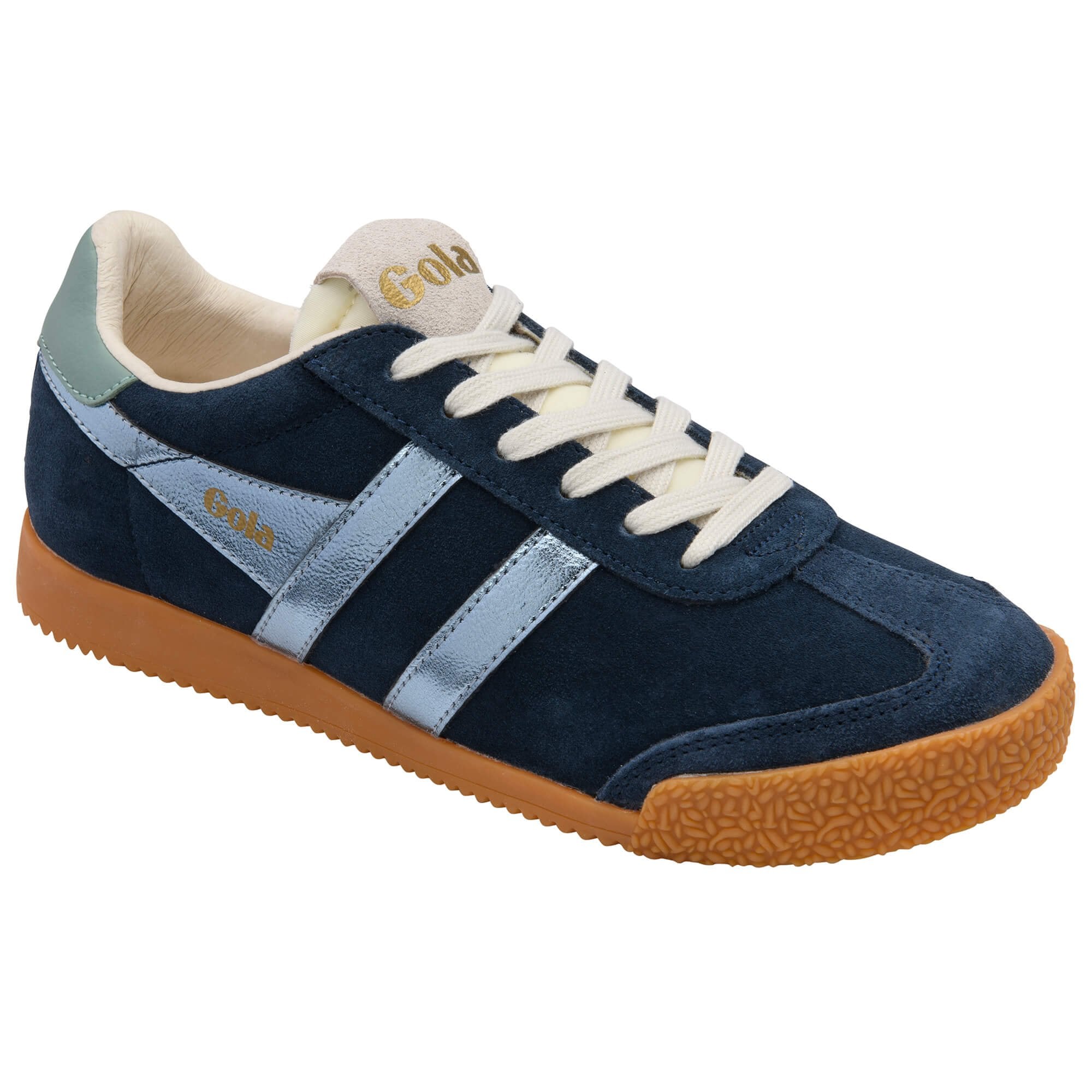 Navy blue trainer with white laces and brown sole on a white background