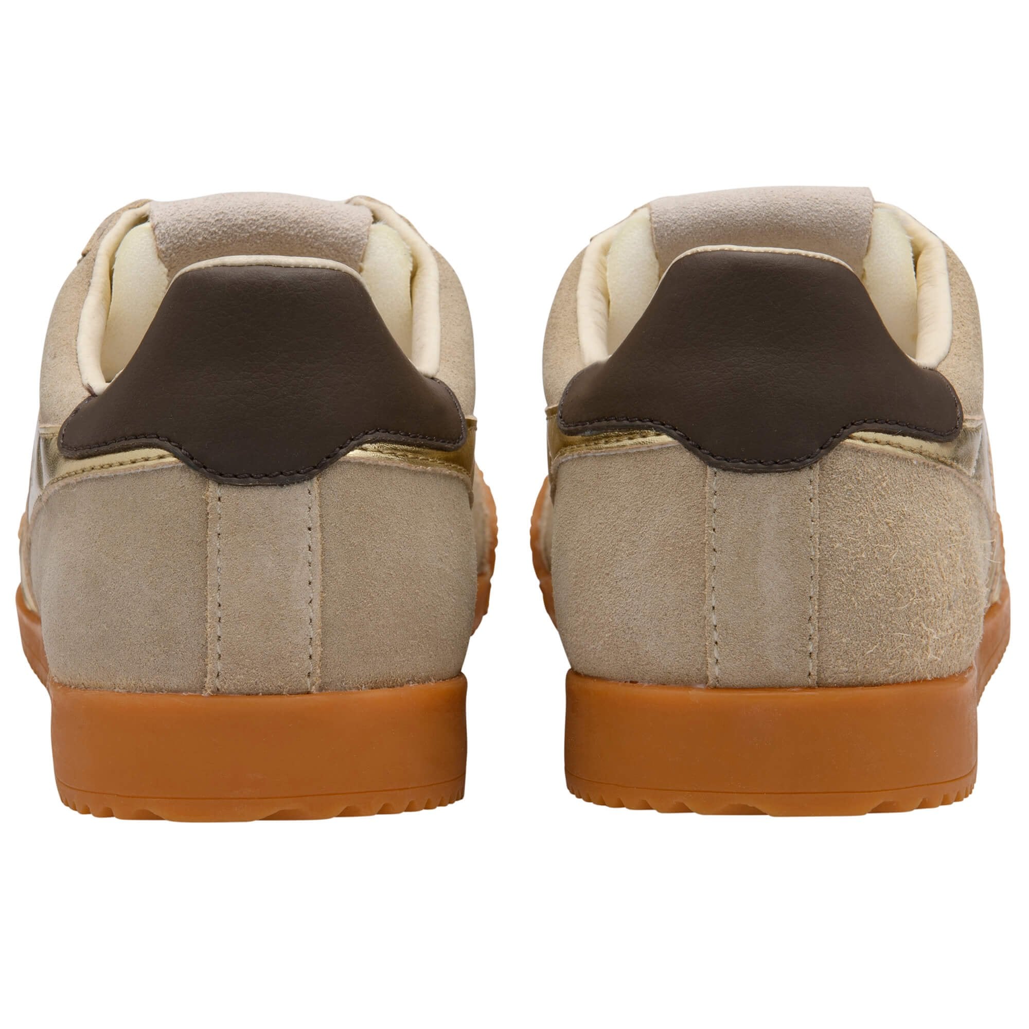 Pair of brown and beige trainers on a white background
