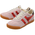 Pink trainers with red stripes and brown soles on a white background
