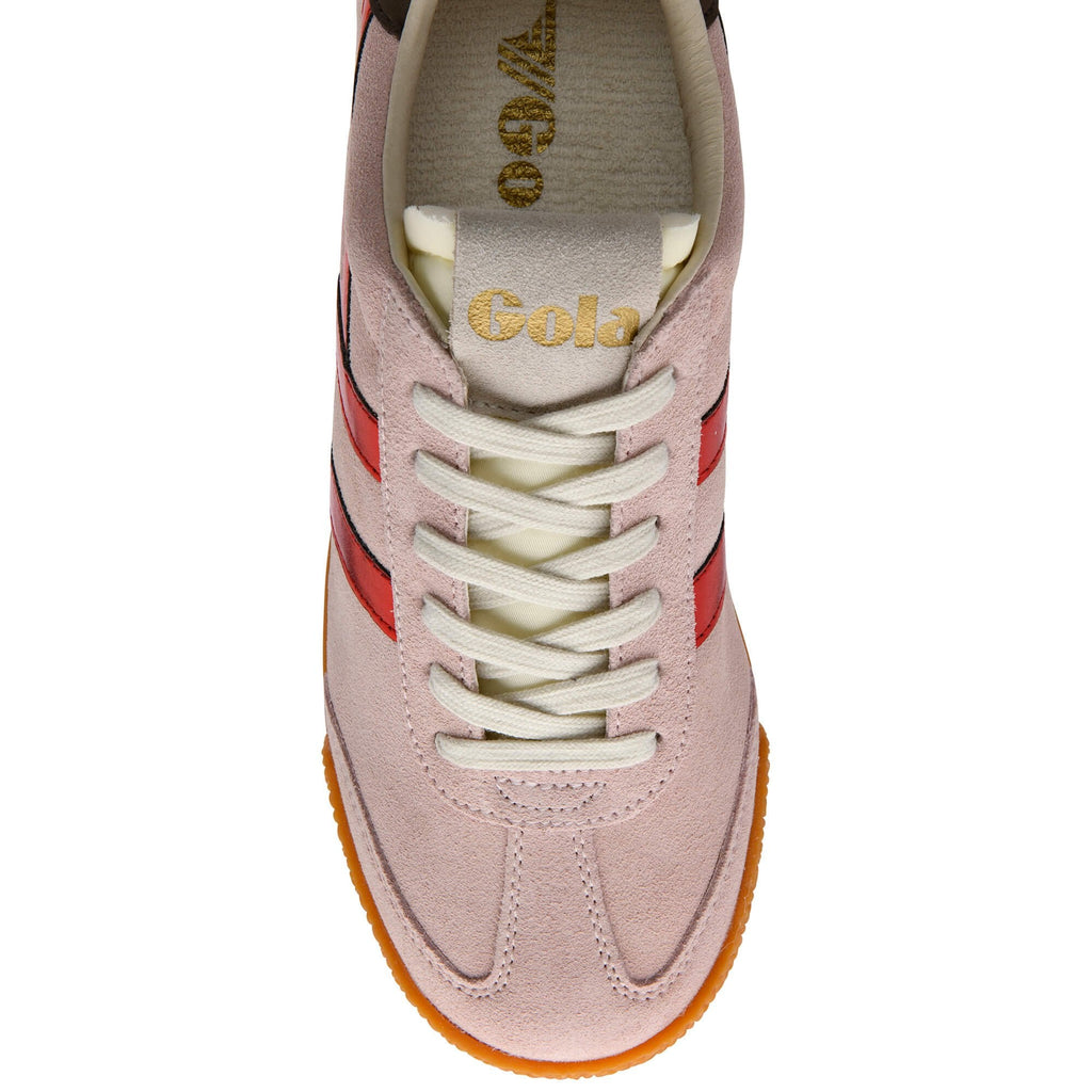 Pink trainer with red accents and white laces on a white background